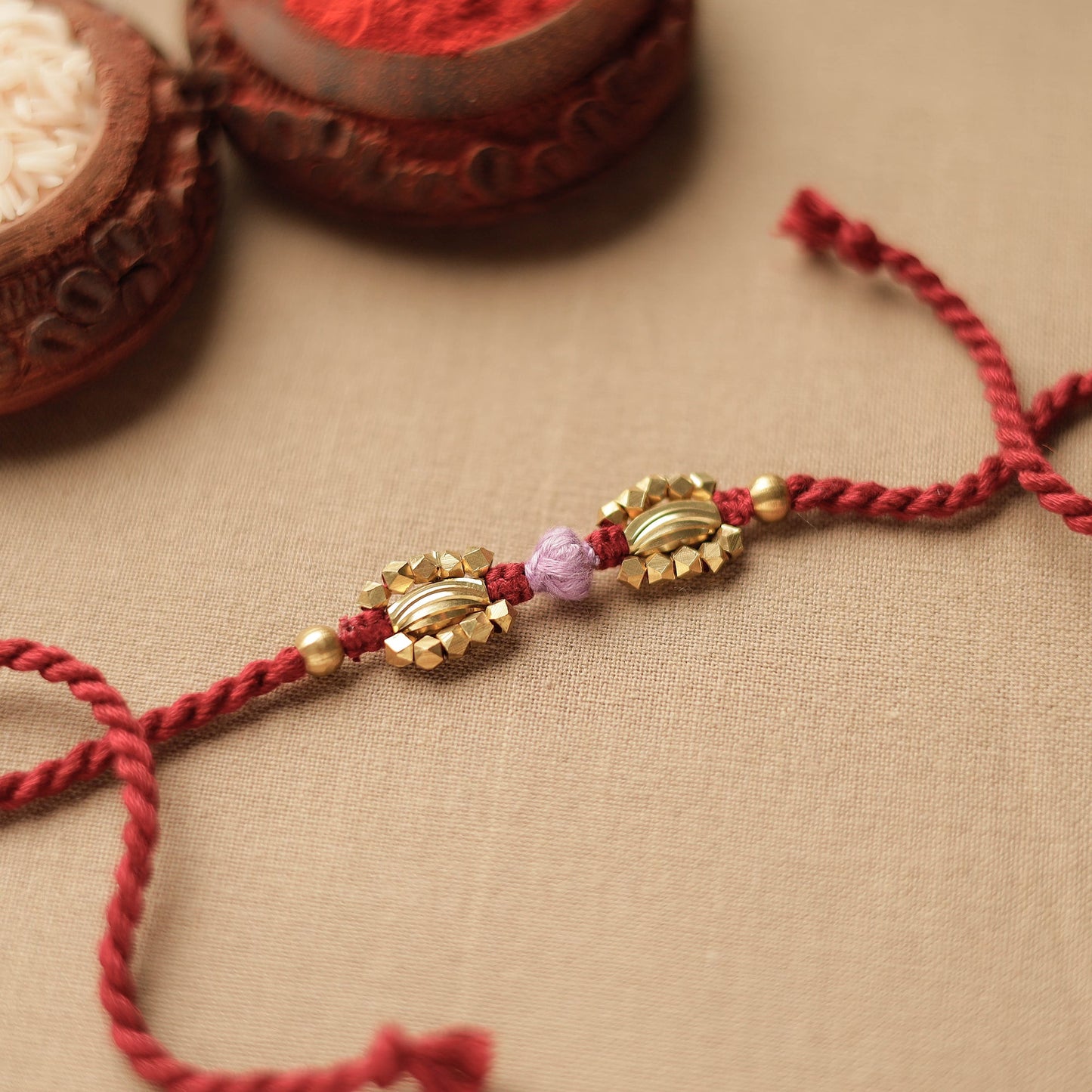 Tribal Dokra Craft Brass & Threadwork Rakhi 15 Online at iTokri.com