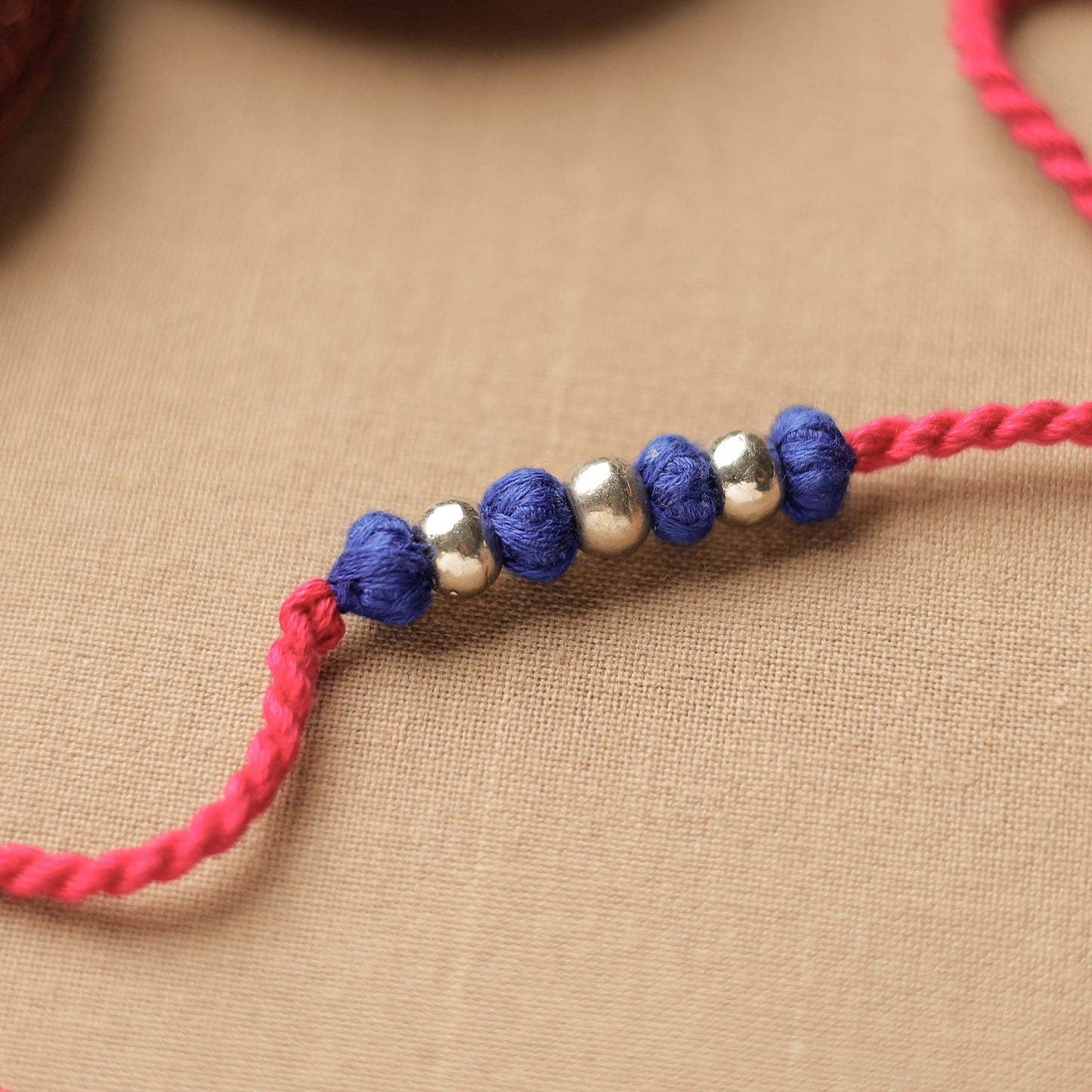 Tribal Dokra Craft GS & Threadwork Rakhi 19 Online at iTokri.com
