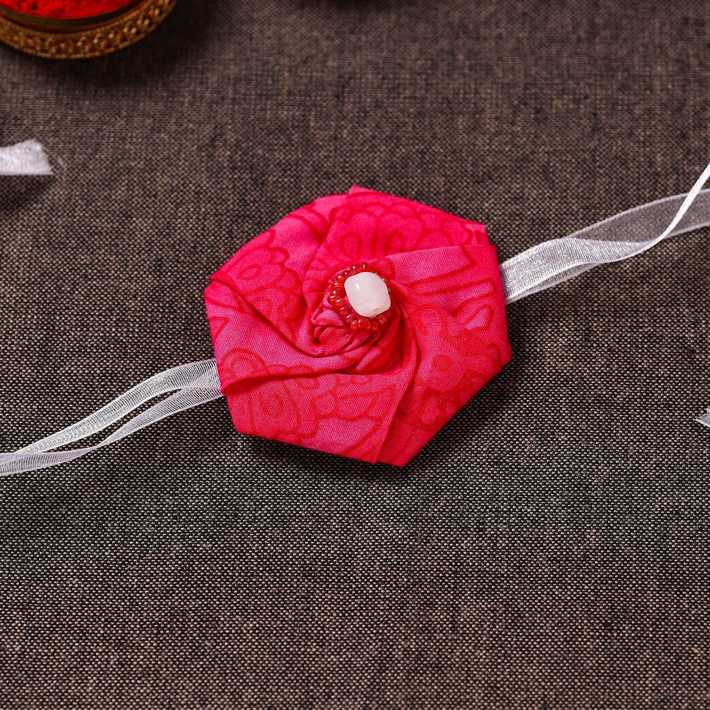 Twisted Rose - Handmade Blue Mango Rakhi