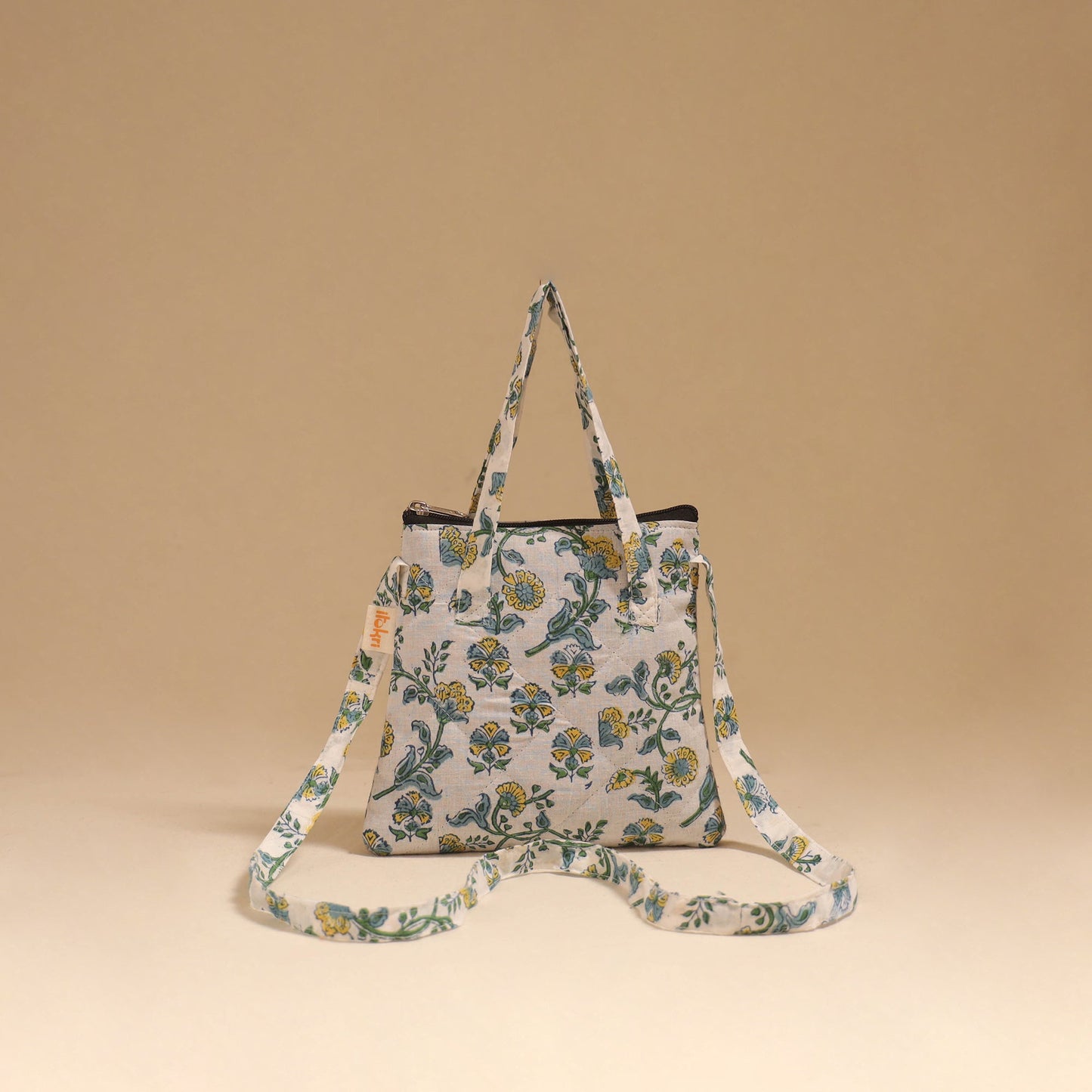 Handcrafted quilted sling bag 11