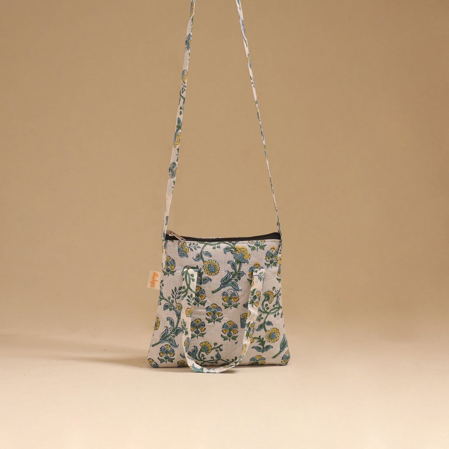 Handcrafted quilted sling bag 11