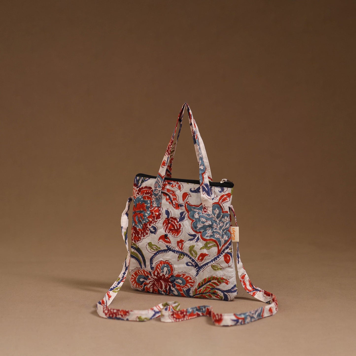 Handcrafted quilted sling bag 11