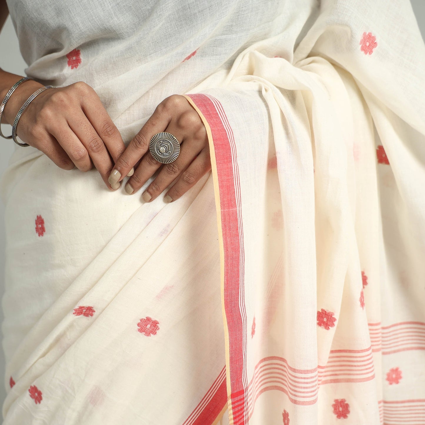 White - handloom cotton phulia jamdani saree with tassels