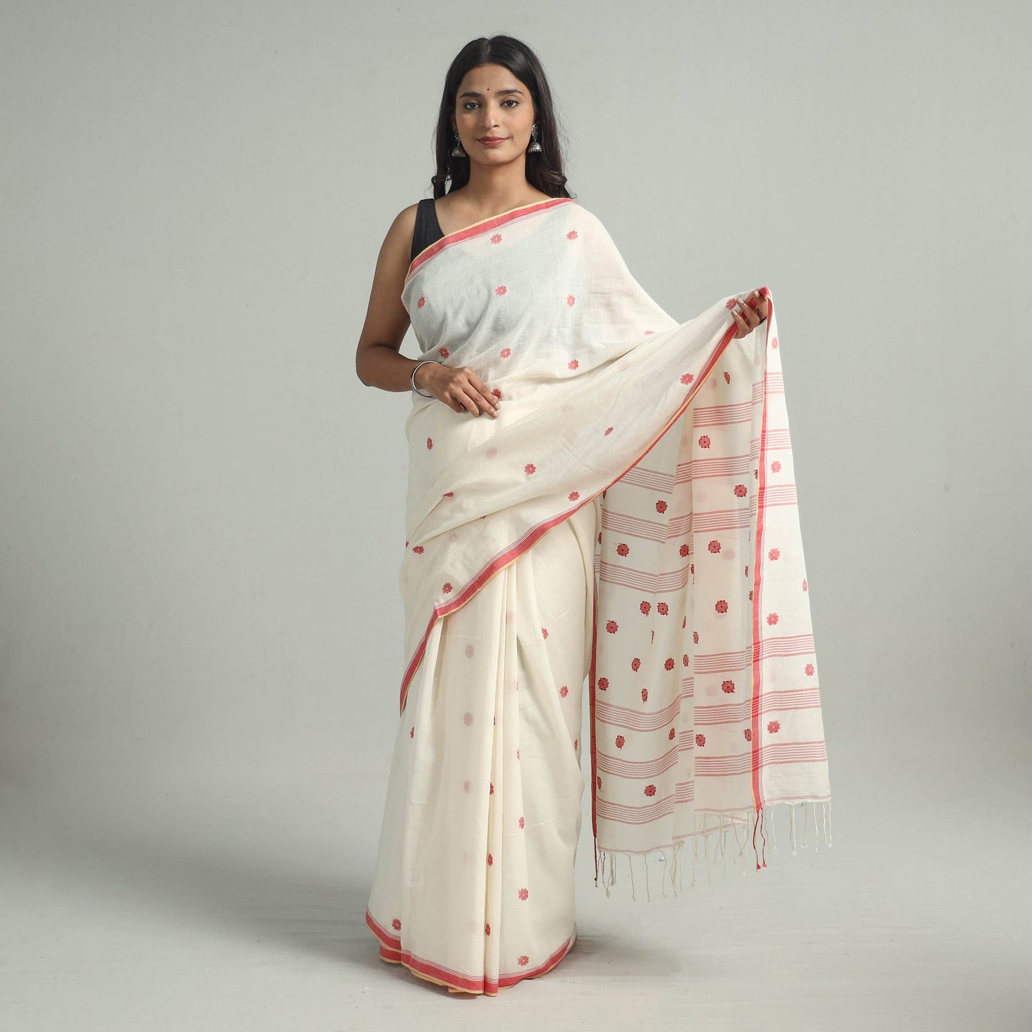 White - handloom cotton phulia jamdani saree with tassels
