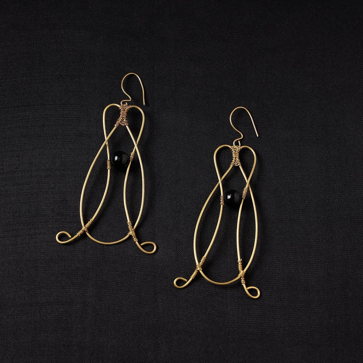 Brass metal handcrafted dokra earrings by asalkaar