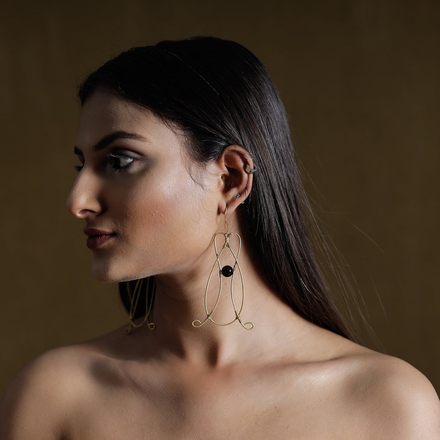 Brass metal handcrafted dokra earrings by asalkaar