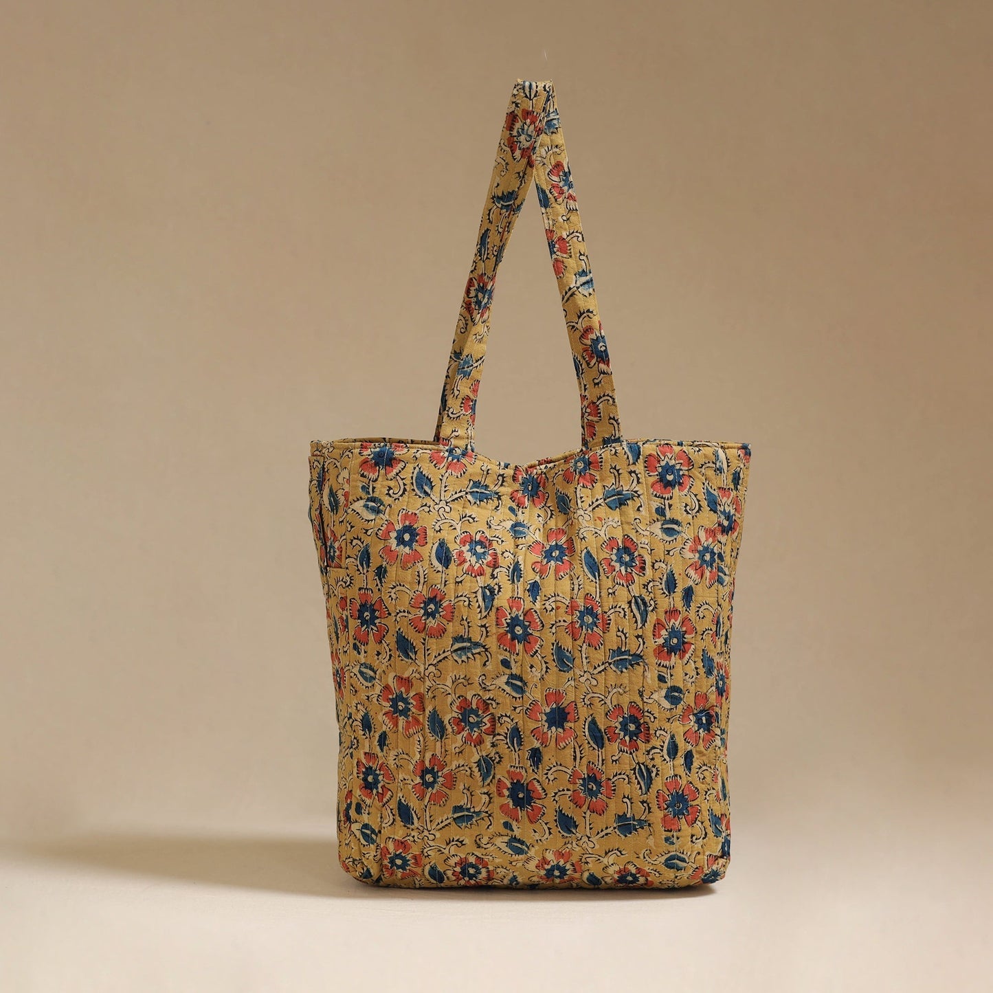 Handcrafted quilted kalamkari block printed fabric tote bag