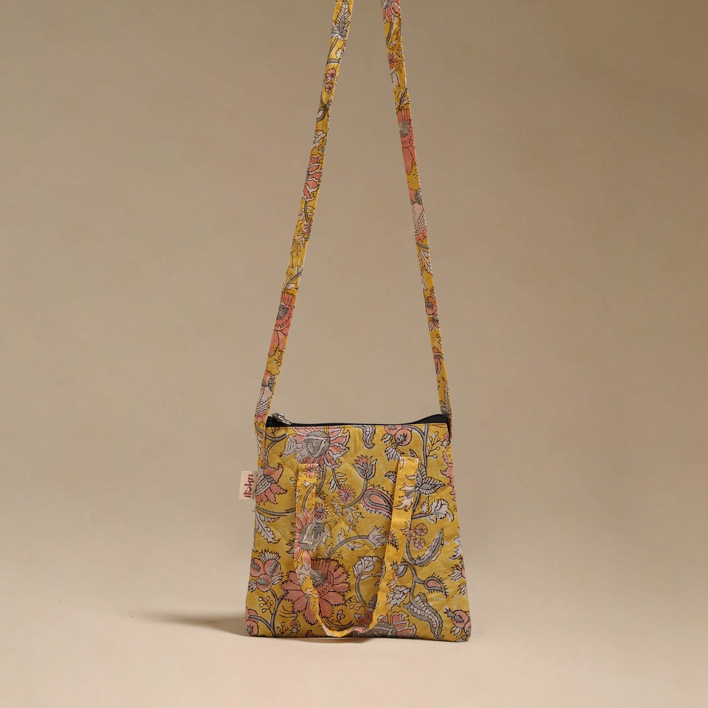 Handcrafted quilted sling bag 01