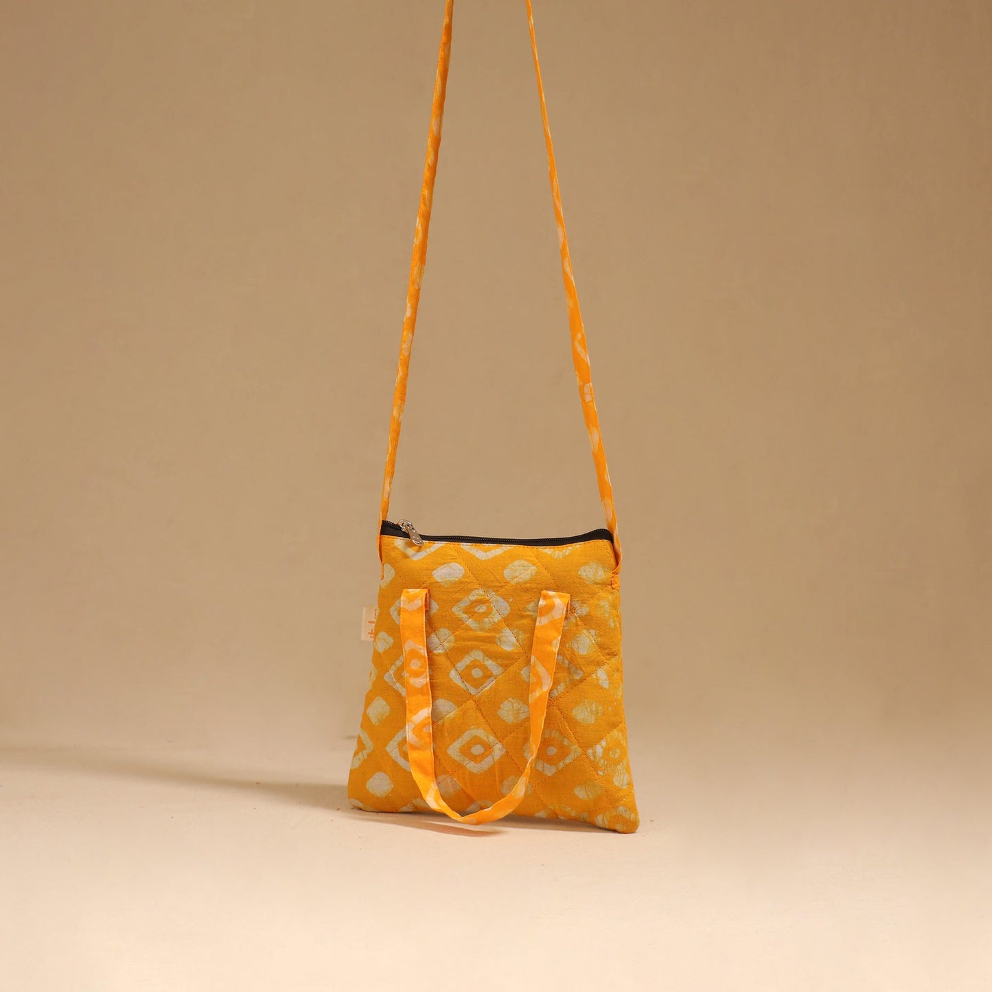 Handcrafted quilted sling bag 29