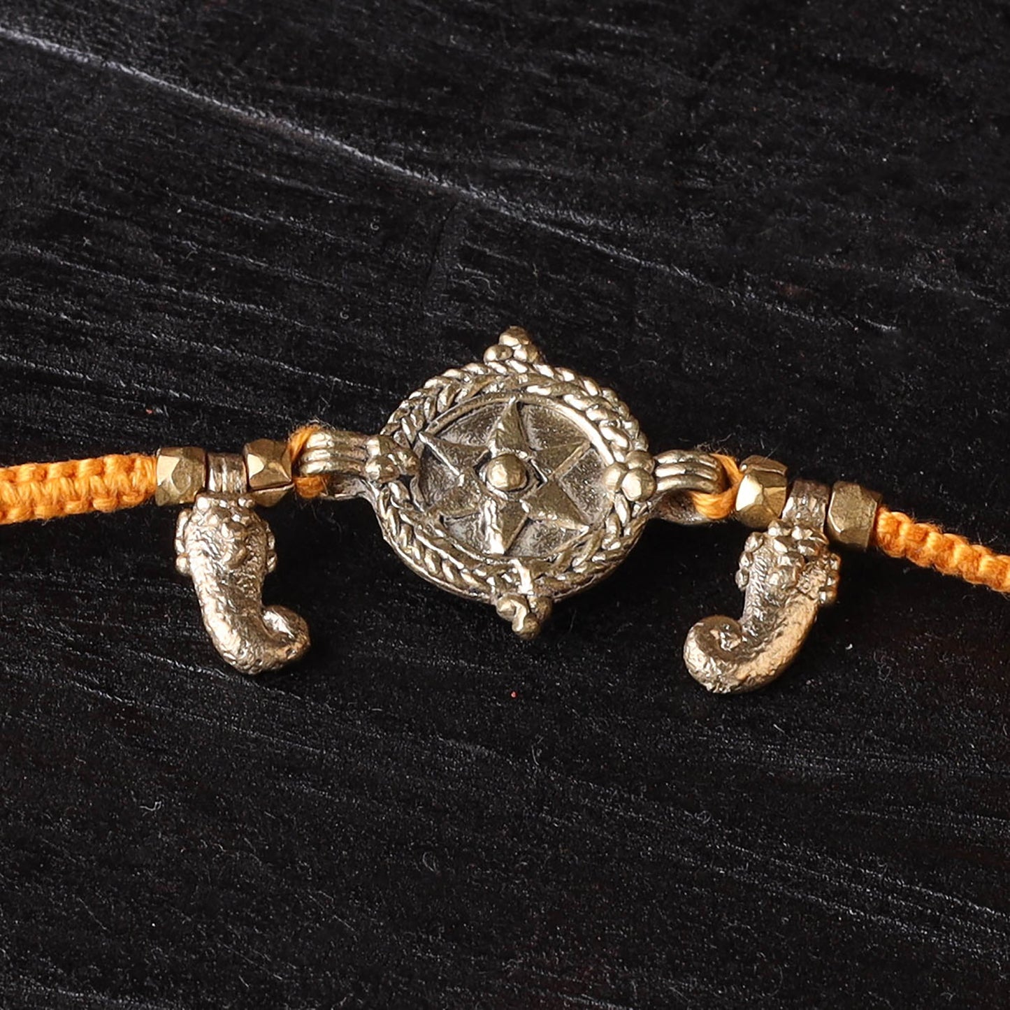 Handcrafted tribal dokra brass thread rakhi 26