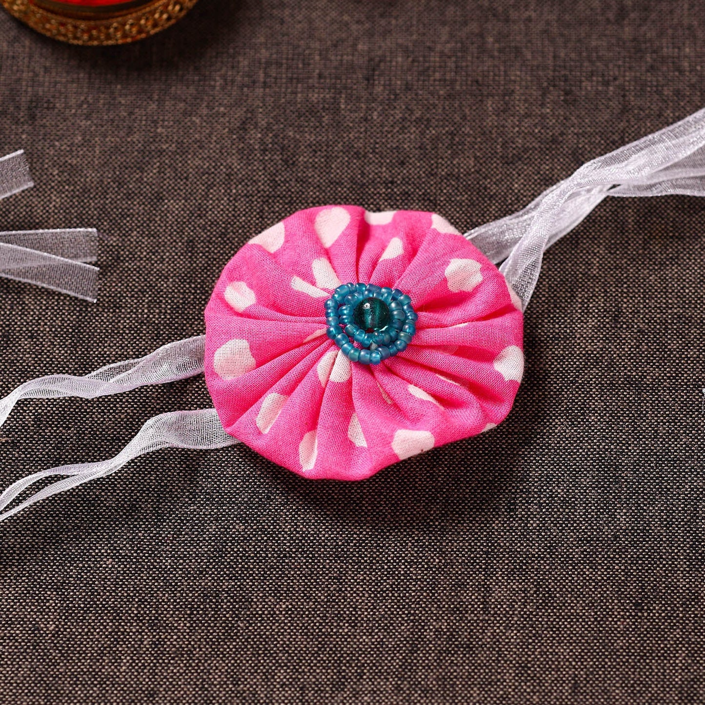 Yo Yo Flower - Handmade Blue Mango Rakhi