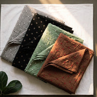 Bandhani Tye-Dye Fabrics. Featuring a majestic bandhani pattern, this fabric is hand-tied and dyed using the traditional technique practiced by the artisans of Kutch. 
