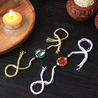 Handmade enameled rakhi by ekibeki