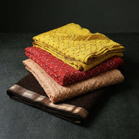 Bandhani Tye-Dye Fabrics. Featuring a majestic bandhani pattern, this fabric is hand-tied and dyed using the traditional technique practiced by the artisans of Kutch. 