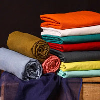 itokri kota doria fabrics. Kota Doria is a blend of strong cotton and lustrous silk yarns (70% cotton x 30% silk), and is known for its lightweight and sheer texture. This fabric is handloom woven in the Kota district of Rajasthan.