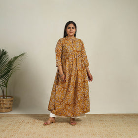 Buy Yellow Printed Cotton Flared Kalamkari Kurta For Women
