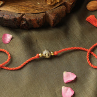 Dokra Brass Rakhi with Karachi Halwa