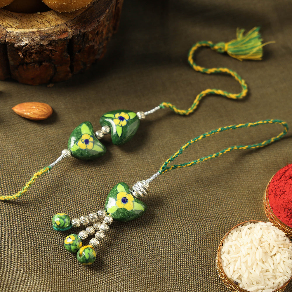 Patwa Blue Pottery Beads Bhaiya Bhabhi Rakhi with Besan Laddu