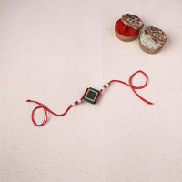 Reusable bishnupur handpainted terracotta rakhi 37