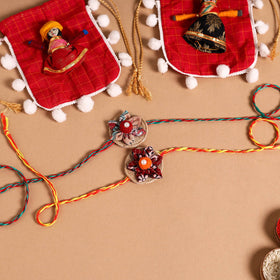  Handmade Fabric Flower Jute Rakhi (Set of 2)