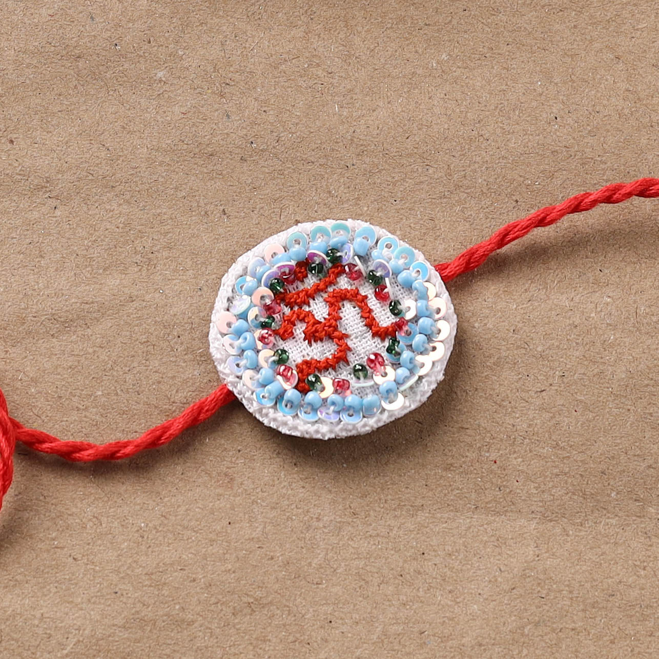 Hand Embroidered Thread Work Rakhi 03