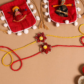  Handmade Fabric Flower Jute Rakhi (Set of 2)