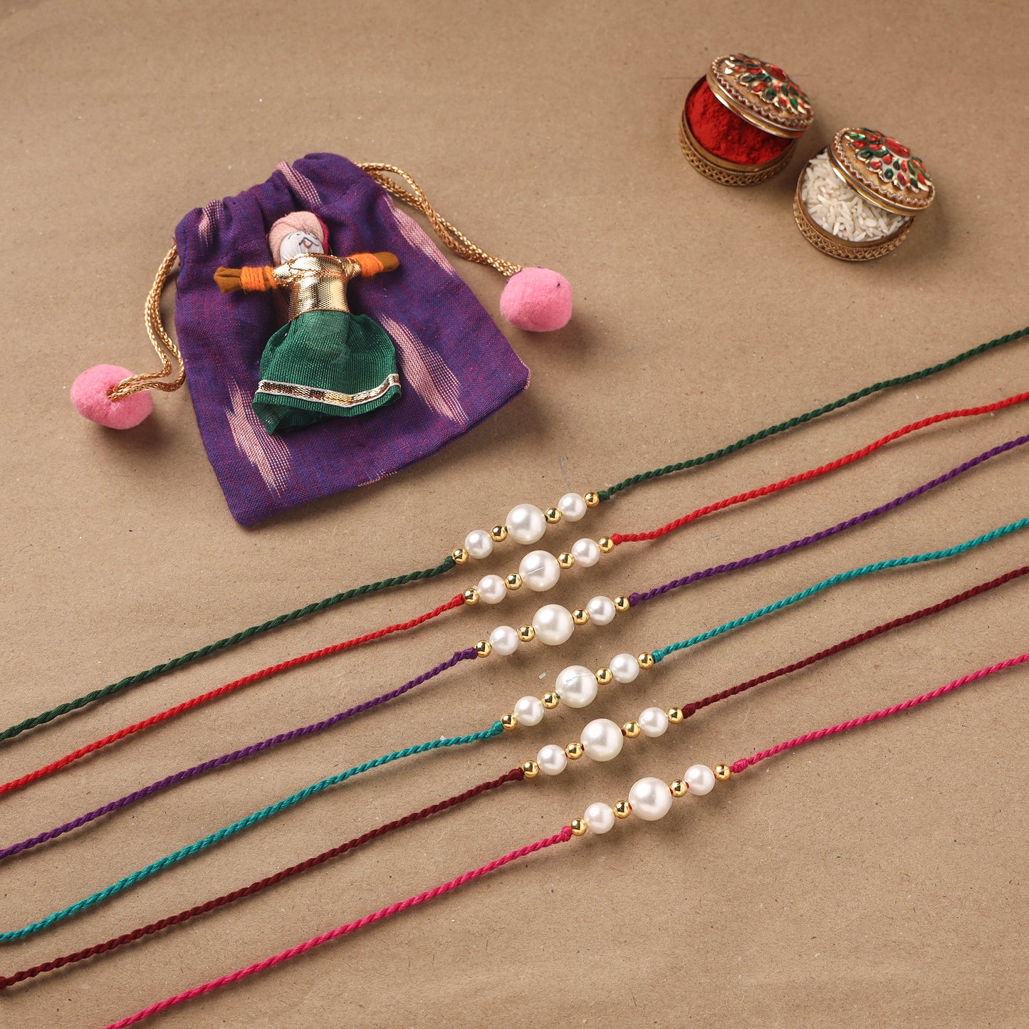 Handmade Pearl Rakhi (Set of 6) 01
