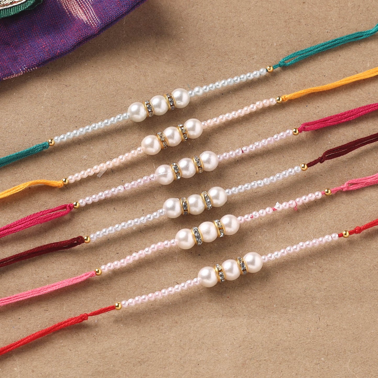 Handmade Pearl Rakhi (Set of 6) 03
