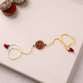Swastika - Hand Embroidered Bead Work Felt Rakhi 08