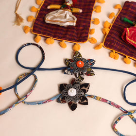  Handmade GS Fabric Flower Rakhi (Set of 2)