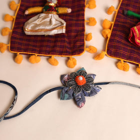  Handmade GS Fabric Flower Rakhi (Set of 2)