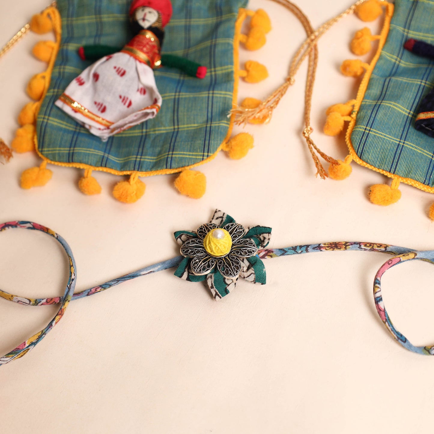  Handmade GS Fabric Flower Rakhi (Set of 2)