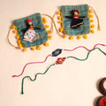  Handmade Pearl Fabric Rakhi (Set of 2)