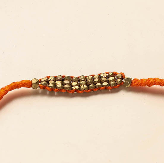 Tribal Dokra Craft Brass Rakhi by Miharu 26