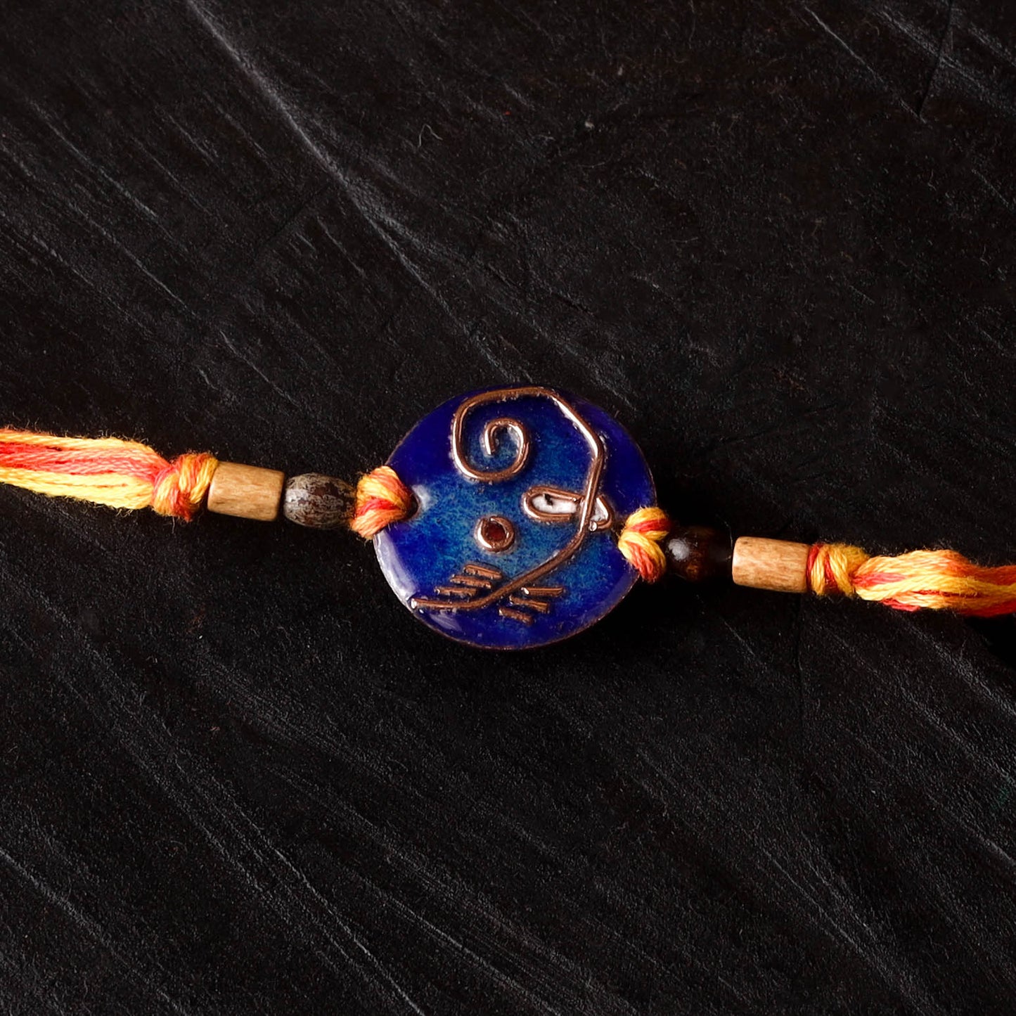Geometric Ganesha - Copper Enamel Rakhi by Ekibeki 03