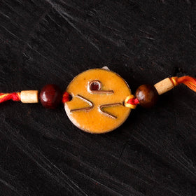 Lol - Copper Enamel Work Rakhi by Ekibeki 40