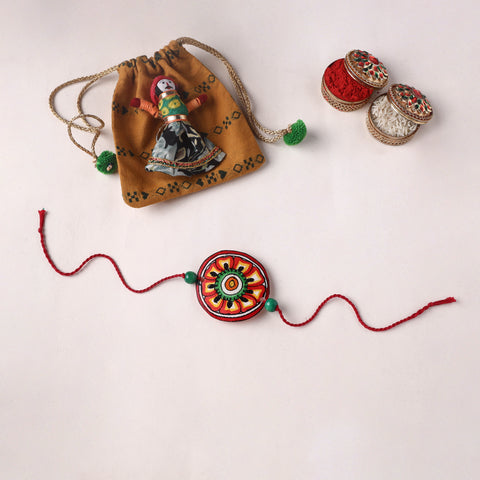 Handpainted Tholu Bommalata Leather Rakhi (Assorted) 01