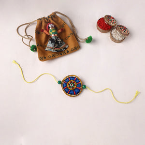 Flower - Reusable Handpainted Tholu Bommalata Leather Rakhi with Potli (Assorted) 03