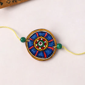 Handpainted Tholu Bommalata Leather Rakhi (Assorted) 03