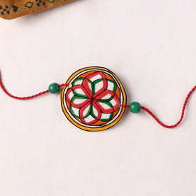 Handpainted Tholu Bommalata Leather Rakhi (Assorted) 04