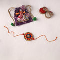 Flower - Handpainted Tholu Bommalata Leather Rakhi (Assorted) 09