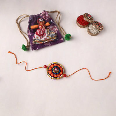 Flower - Handpainted Tholu Bommalata Leather Rakhi (Assorted) 09