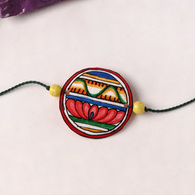 Handpainted Tholu Bommalata Leather Rakhi (Assorted) 11