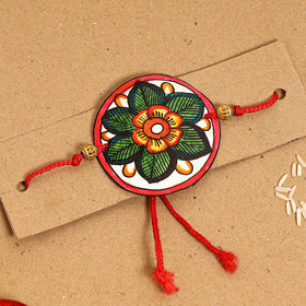  Handpainted Tholu Bommalata Leather Rakhi 