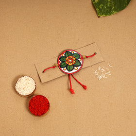  Handpainted Tholu Bommalata Leather Rakhi 
