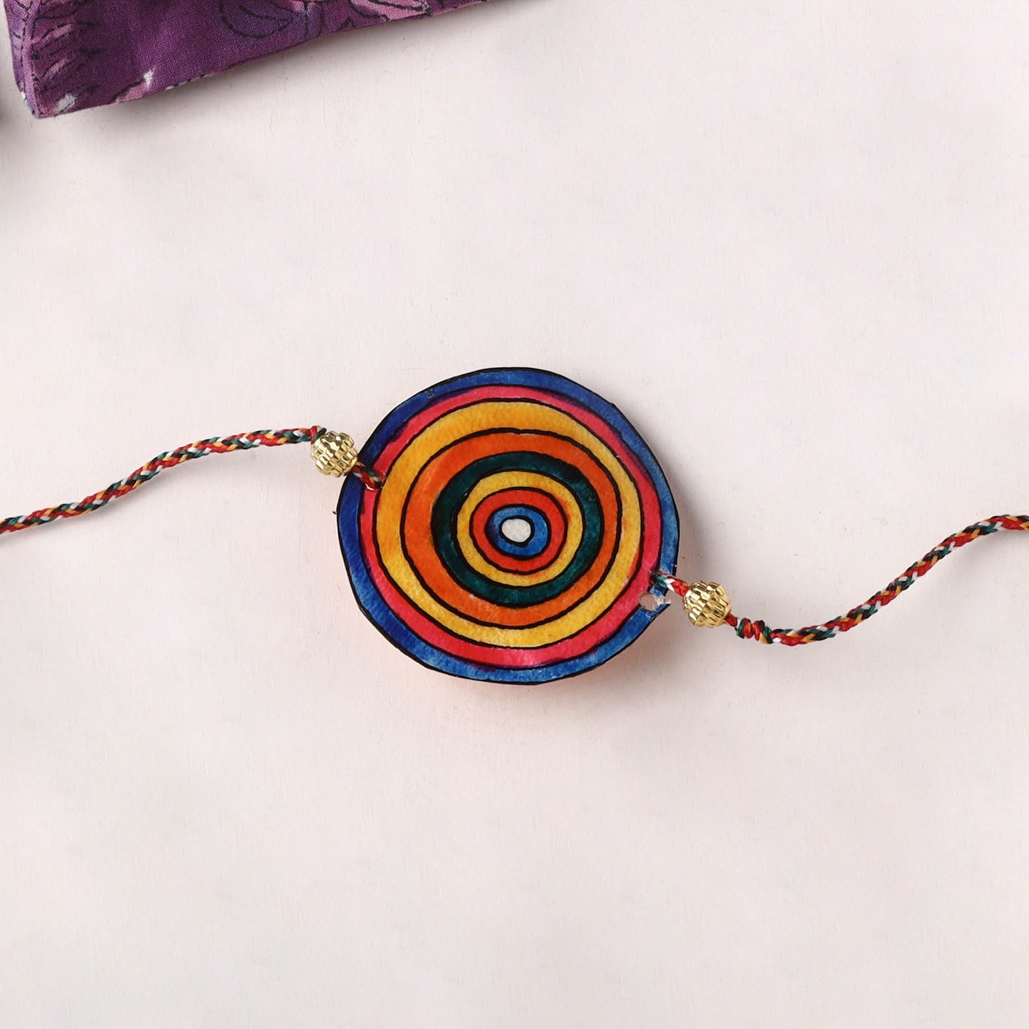 Handpainted Tholu Bommalata Leather Rakhi (Assorted) 17