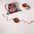 Peacocks - Handpainted Tholu Bommalata Leather Rakhi (Assorted) 22