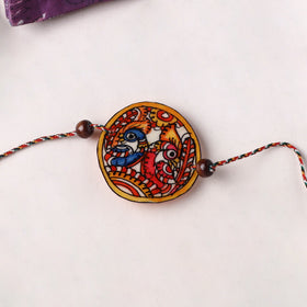 Peacocks - Handpainted Tholu Bommalata Leather Rakhi (Assorted) 22