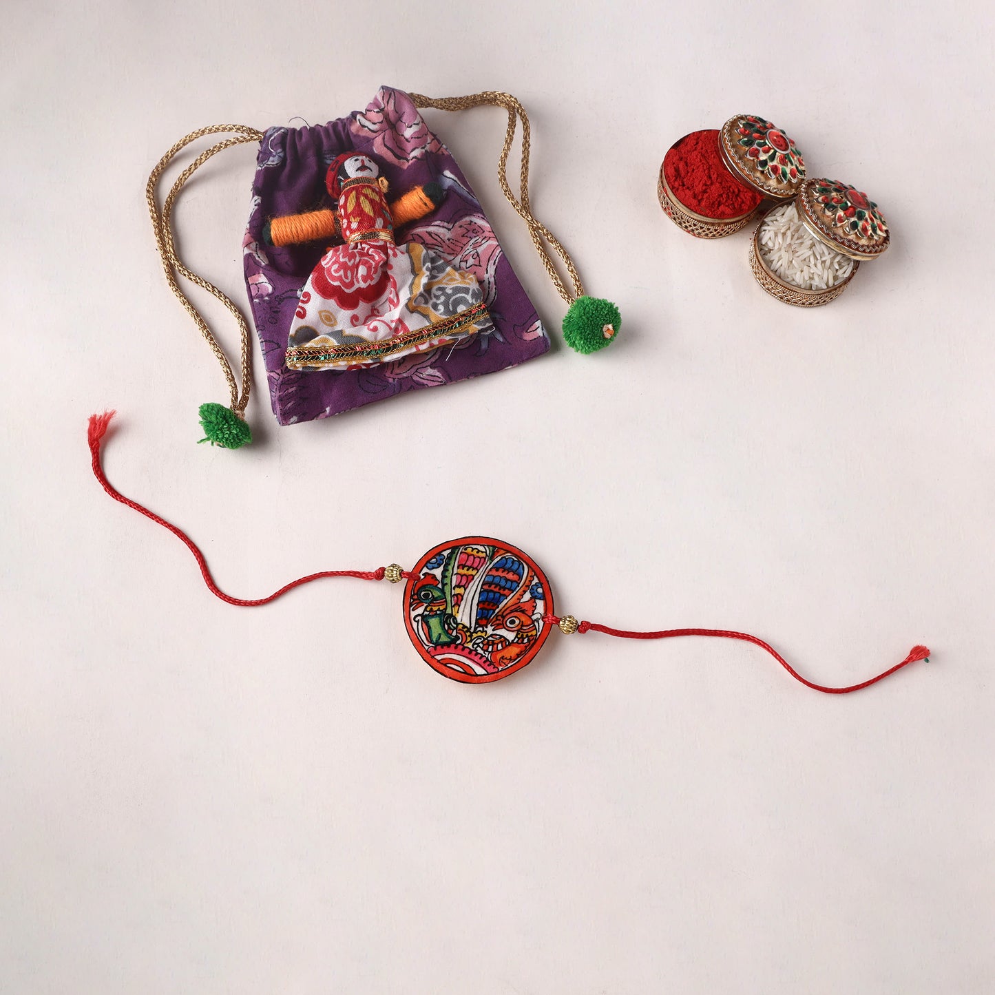 Peacocks - Handpainted Tholu Bommalata Leather Rakhi (Assorted) 23