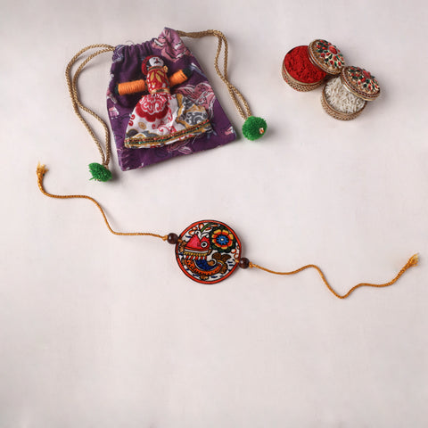 Handpainted Tholu Bommalata Leather Rakhi (Assorted) 24